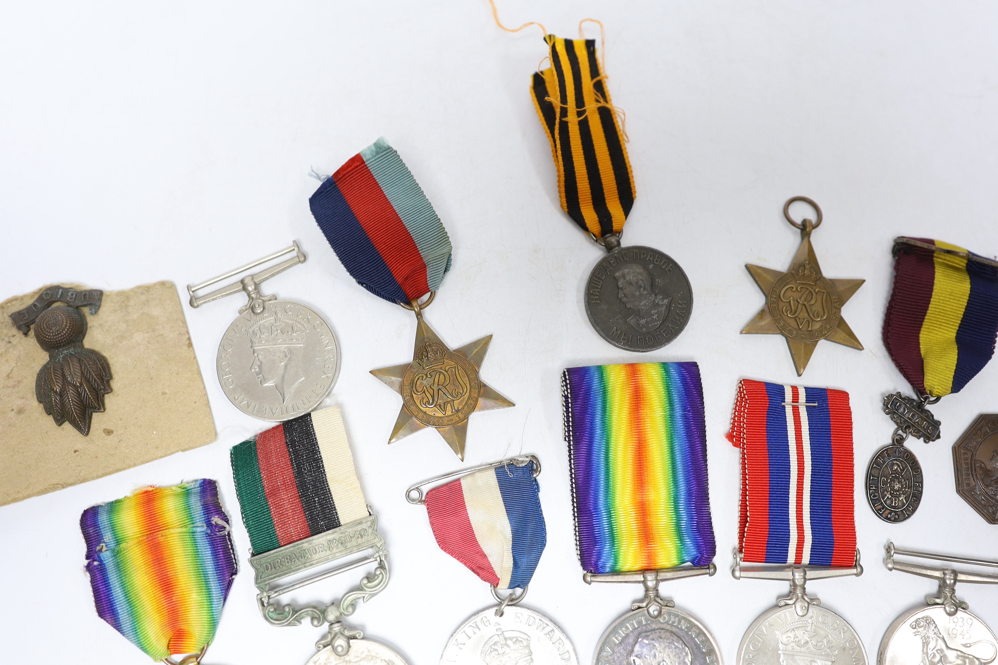 Twelve medals including; a British War Medal, a Victory Medal, three 1939-45 War Medals, two 1939-45 Stars, an Edward VIII Coronation Medal, a Soviet Stalin Victory medal, a Pakistan General Service Medal, a George VI Co
